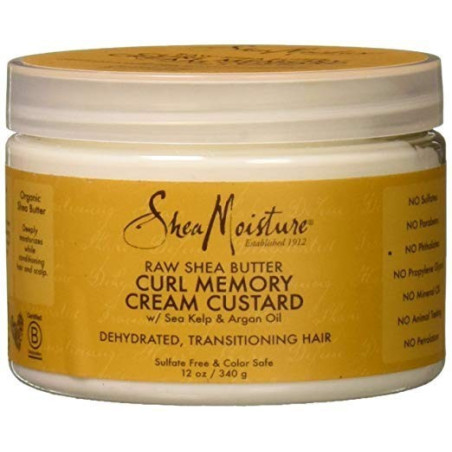 Curl-loving oils blend with certified Raw Shea Butter in a conditio...