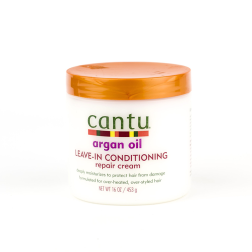 Apply Cantu Argan Oil Leave-In Conditioning Repair Cream daily to s...